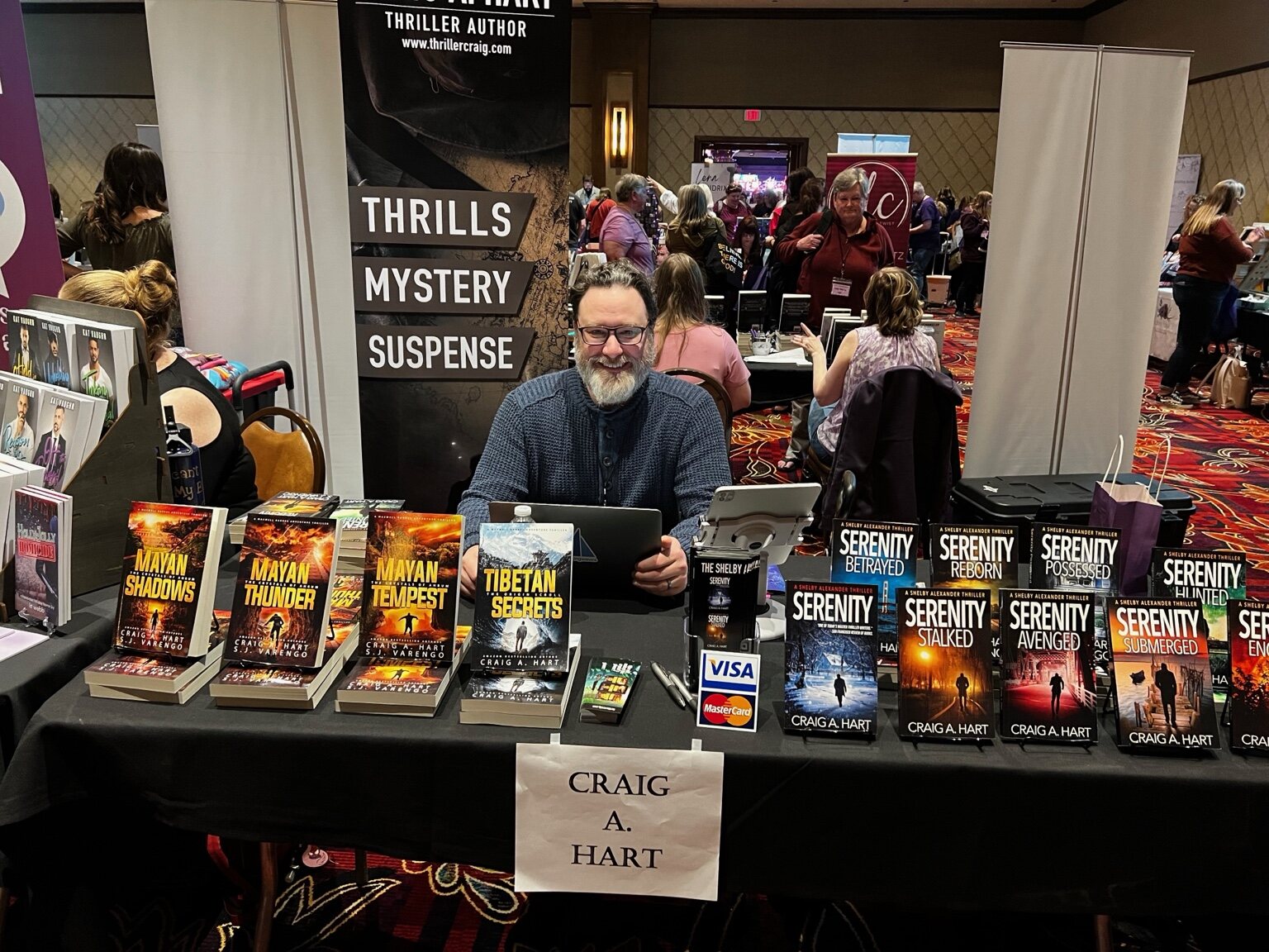 Craig A. Hart at his conference book table